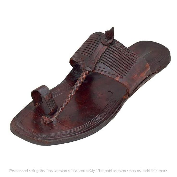 30% OFF on all items and get 10% EXTRA Discount on Purchase THREE or MORE items COUPON CODE-GANPATI . Handmade Jutti closure:- pull on Color:- Brown Material:- Leather Made:- Handmade Sole:- Leather Can Be Personalized:- Yes Transform your footwear collection with the rustic charm of our exquisite Kolhapuri slippers, a fusion of traditional Indian craftsmanship and contemporary style. These handmade, brown leather slides epitomize the essence of authentic Kolhapuri chappals, renowned for their r Traditional Brown Toe Post Flip Flops, Traditional Leather Flip Flops With Single Toe Strap, Traditional Leather Flip Flops With Leather Sole, Traditional Adjustable Brown Flip Flops, Traditional Adjustable T-strap Sandals With Single Toe Strap, Traditional Brown Leather Flip Flops, Festival Sandals With Leather Sole And Single Toe Strap, Brown Leather Sandals For Festivals, Traditional T-strap Sandals With Round Toe