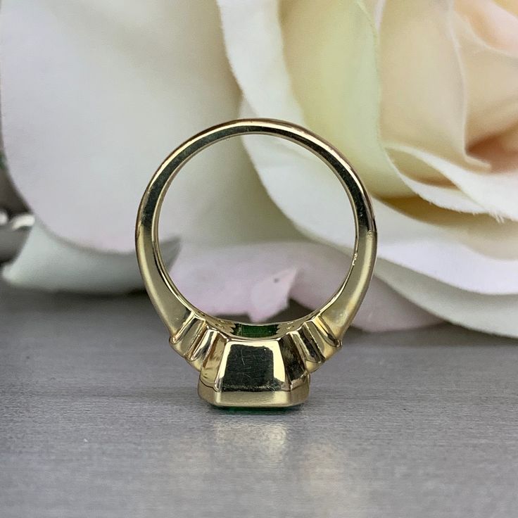 "The ring pictured is lab created emerald with moissanite accents. Also shown in 14k white gold instagram: https://www.instagram.com/p/BvKUII-lfxA/ -Approximate total carat weight: approx. 2.30ctw diamond equivalent -Center Stone Size: 8x8mm - approx. 2.20ct diamond equivalent -Center Stone Shape: asscher -Gem Type: lab created emerald -Stone Clarity: VS2 -Stone Color: Green -Moh's Scale: 8.5 hardness -Side Stones Size: 6 round - approx. 0.12ctw. diamond equivalent -Gem Type: moissanite -Metal T Half Bezel Ring, Asscher Cut Engagement Ring, Asscher Cut Engagement Rings, Half Bezel, Yellow Rings, Lab Created Emerald, Bezel Ring, Ring Emerald, Asscher Cut