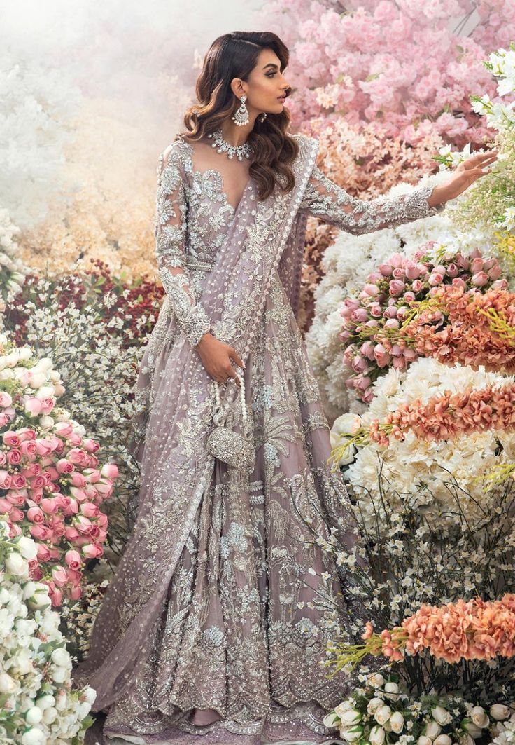 Buy Embellished Lilac Lehenga Gown for Indian Bridal Wear in Premium Quality Detailed Dress paired with Dupatta and Lehnga. Customizable. Fast Shipping Lilac Asian Wedding Dress, Saree For Walima Function, Lilac Walima Dress, Lilac Lehenga Bridal, Lilac Lehenga Indian Weddings, Lilac Gown Dress, Glamorous Wedding Gown For Eid, Elegant Lavender Sharara With Zari Work, Lavender Sharara With Intricate Embroidery For Wedding