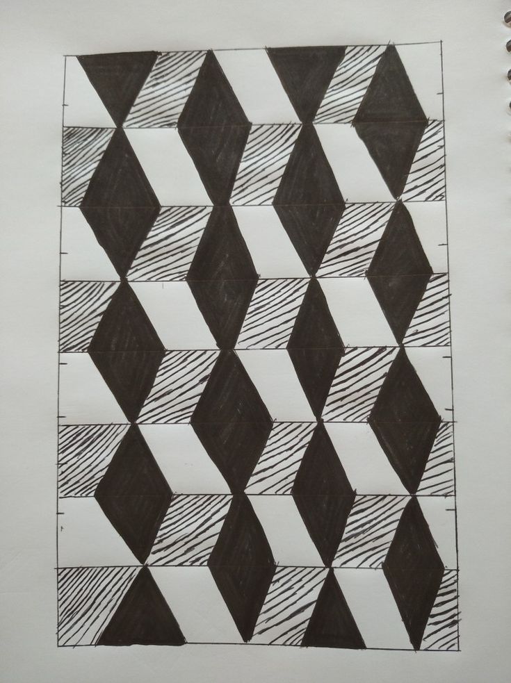 a black and white drawing on paper with some lines in the middle, next to a pencil