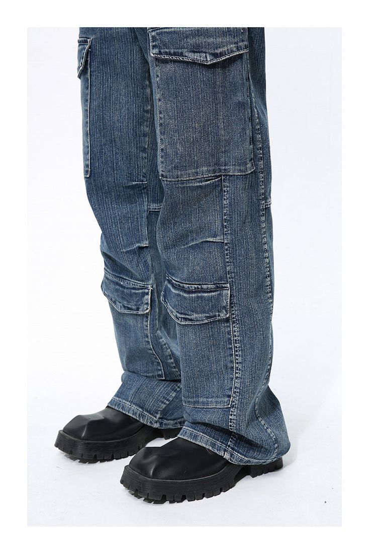 Revive the legend of Pre-millennium fashion with our 2023 Spring-Summer Collection Carpenter Stonewashed Jeans for Men! These hip-hop-inspired jeans feature a mid-waist. zipper & button closure and are crafted from pebble-washed fabric in a baggy silhouette. Why You'll Fall In Love Embodying the conventional appeal of the 90s. these carpenter jeans are a perfect blend of old-school style and trendy sophistication. Their unique rock-washed finish gives them an irresistible texture and a relaxed. effortless look. The mid-waist and zipper/button closure ensure a perfect fit. Unmissable Highlights: 90s Vibe: Feel the nostalgia of the 90s with these jeans. crafted with all the classic hallmarks of the decade. Baggy Silhouette: The relaxed fit of these jeans gives you unmatched comfort. allowing Urban Dark Wash Jeans For Streetwear, Urban Style Rigid Denim Cargo Jeans For Spring, Urban Style Spring Cargo Jeans In Rigid Denim, Spring Urban Cargo Jeans In Rigid Denim, Summer Streetwear Mid-rise Cargo Jeans, Hip Hop Denim Blue Cargo Jeans, Urban Style Washed Blue Cargo Jeans, Dark Wash Hip Hop Jeans For Streetwear, Dark Wash Jeans For Hip Hop Streetwear