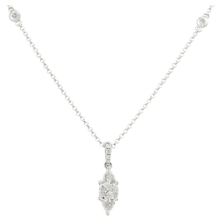 18k White Gold 0.71ctw Mosaic Marquise Cut Diamond Station Necklace Material: 18k White Gold Diamond Details: Approximately 0.71ctw of Marquise cut and Round Brilliant Diamonds. There are  Necklace Length: Adjustable from 17-18" Total Weight: 2.98g (1.91dwt) Additional Details: This item comes with a presentation box! SKU: A30316024 Luxury Marquise Diamond Necklace With Single Diamond, Luxury Marquise White Gold Necklace, Luxury Marquise Necklace For Anniversary, Luxury White Gold Marquise Necklace, Luxury Marquise White Gold Necklaces, Exquisite Silver Marquise Necklace, Wedding Platinum Marquise Necklace, Platinum Marquise Necklace For Wedding, Luxury Marquise Diamond White Necklace