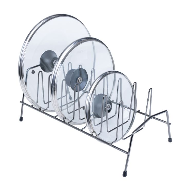 three round plates on a metal rack with wheels