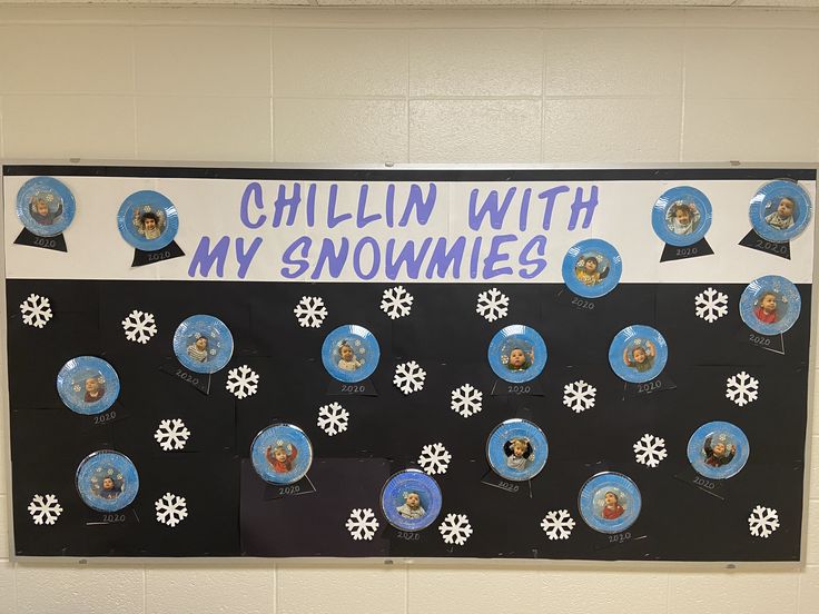 a bulletin board with snowflakes on it that says chillin with my skimies