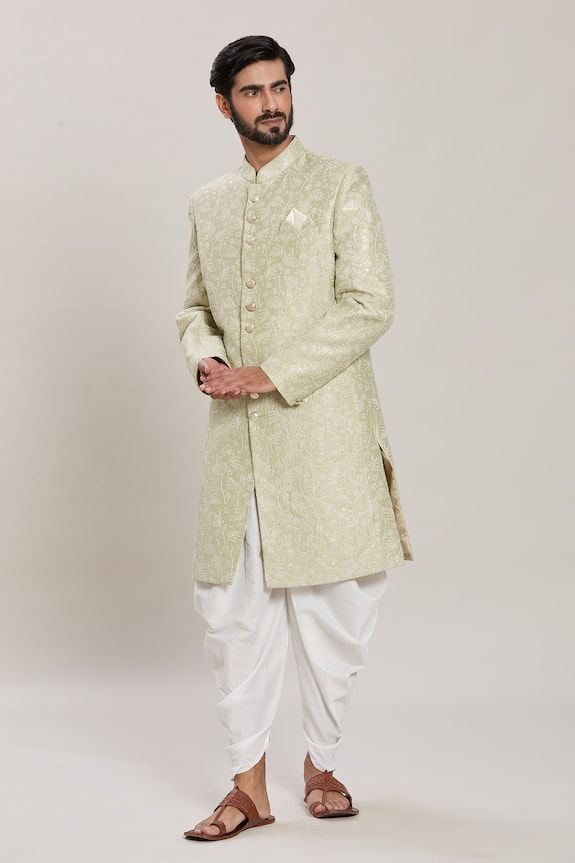 Pista green full sleeves malai silk kurta with all over Gulbahar embroidery using zari and sequin highlights. Paired with a white peshawari pant. - Aza Fashions Green Bollywood Sherwani In Chanderi Fabric, Bollywood Style Green Chanderi Sherwani, Bollywood Green Chanderi Sherwani, Green Bollywood Style Chanderi Sherwani, Semi-stitched Green Chanderi Sherwani, Semi-stitched Green Bollywood Sherwani, Green Raw Silk Sherwani With Dabka Detail, Green Raw Silk Dabka Sherwani, Green Semi-stitched Chanderi Sherwani