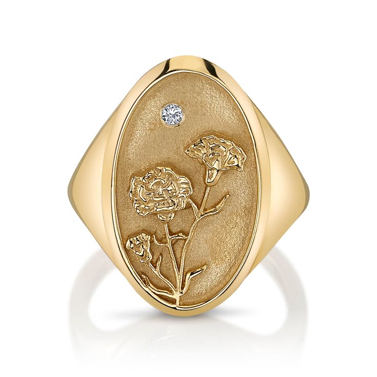 DESCRIPTION The January Birth Flower Signet Ring features a carnation, one of the few flowers to bloom in cool weather. Shaped like a vintage saint charm with a detailed relief carving and sparkling diamond, this statement ring is handmade with love in Los Angeles. Show love to your favorite January baby (or yourself!) with this perfect addition to your everyday collection. Note that this piece is handmade to order. Please allow for a 3-4 week lead time as we craft this special ring. Due to the January Birth Flower, May Birth Flowers, January Birth Flowers, January Baby, Mother Daughter Bracelets, Relief Carving, Diamond Signet Ring, Organic Cleaning Products, Signet Rings