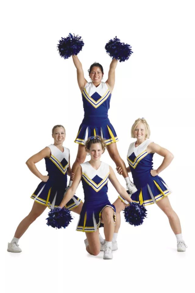 a group of young cheerleaders posing for a photo