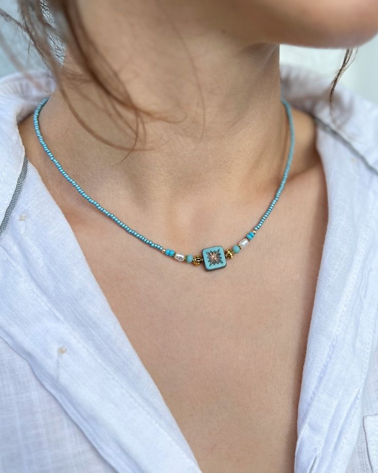 This boho necklaces are  the perfect accessory for any outfit!  It comes in two colors; Turquoise and Black. Both them is made with small beads, pearl and gold spacers. It has an extension chain allowing for easy adjustability and remove.  It is ready to ship immediately. Necklace Care: We do not recommend wearing in the shower to avoid tarnishing and prolong the life of your pieces! Necklace Length: 16.5 inch (with 1 inch extender to make the necklace adjustable to 17.5 inches) Handmade Necklace Closure: Lobster Claw  Adjustable length Colorful Beads Turquoise Necklace For Beach, Bohemian Choker With Round Letter Beads, Bohemian Turquoise Beaded Necklace With Letter Beads, Bohemian Beaded Choker For Vacation, Bohemian Green Beaded Necklaces With Letter Beads, Beaded Turquoise Necklace For Beach, Green Bohemian Beaded Necklace With Letter Beads, Bohemian Green Beaded Necklace With Letter Beads, Turquoise Bohemian Jewelry With Letter Beads