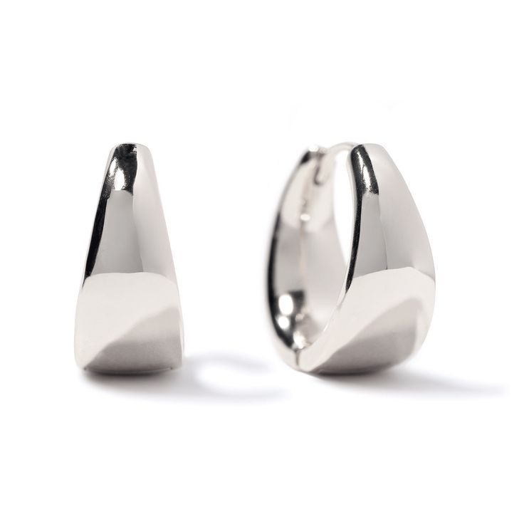 These statement small hoops feature a unique teardrop silhouette, adding a feminine twist to a bold look. Elevate your style and make a statement with these luxurious Sterling Silver hoop earrings. Sterling Silver Inside Diameter 0.5in(13mm), Width 0.3in(8mm) Click closure E190-13S Modern Metal Huggie Earrings For Formal Occasions, Modern Metal Teardrop Earrings, Modern Metal Huggie Earrings For Everyday, Minimalist Teardrop Hoop Earrings With Polished Finish, Minimalist Metal Huggie Earrings For Formal Occasions, Modern Teardrop Huggie Earrings With Polished Finish, Modern Silver Teardrop Earrings Tarnish Resistant, Modern Silver Teardrop Huggie Earrings, Modern Nickel-free Hoop Earrings For Formal Occasions