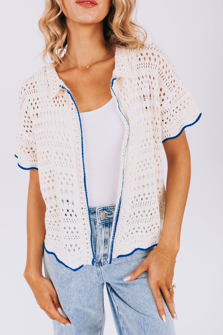 Stay stylish with our On The Boardwalk Top! This crochet knit cardigan features a collar and a vibrant blue lining, perfect for adding a pop of color to any outfit. Comfortable, trendy, and versatile, this top is a must-have for any fashion lover! Details Crochet knit cardigan Collar Blue lining Sizing Approximate measurements: SIZE LENGTH BUST Small 25" 46" Medium 26" 50" Large 27" 52" Fabric has stretchModel is 5’10 wearing small Material 100% Polyester Hand wash coldLay flat to dry Collared Beige Sweater For Spring, Spring Collared Pointelle Knit Sweater, Casual Open Knit Outerwear For Summer, Summer Knit Outerwear For Day Out, Collared Pointelle Knit Tops For Spring, Collared Cardigan For Spring Day Out, Spring Collared Cardigan For Day Out, Spring Cotton Open Knit Outerwear, Spring Collared Pointelle Knit Tops