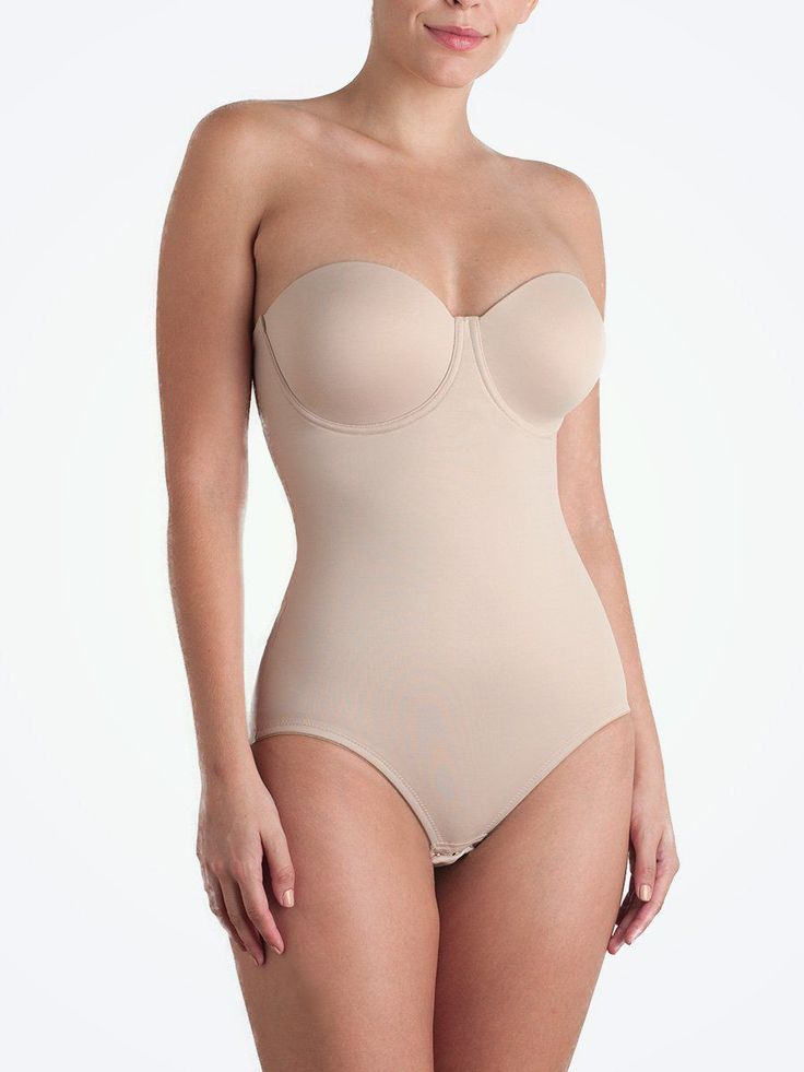 Extra-firm yet comfortable midriff control Hook-and-eye gusset for easy bathroom breaks Back Magic® incorporated for extra comfortable contouring  #TC #TCfineintimates #Shapewear #bodyshaper #bodysuit Strapless Shapewear For Smoothing And Sculpting, Sculpting Strapless Smoothing Shapewear, Strapless Sculpting Smoothing Shapewear, Smoothing Sculpting Strapless Shapewear, Elegant Sculpting Push-up Shapewear, Elegant Shapewear With Sweetheart Neckline, Elegant Stretch Push-up Shapewear, Elegant Push-up Stretch Shapewear, Strapless Shapewear Bodysuit With Built-in Bra