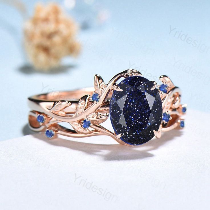 "Nature Inspired Galaxy Blue Sandstone Engagement Ring Set Cluster Sapphire Wedding Ring Set Women Unique Leaves Branch Personalized Gift ≫≫ Item Details Make every ring to order, all rings are handmade in the United States. Metal: Solid 10K & 14K & 18K Gold Gold Color: Rose gold, Yellow gold, White gold ➽ Center Stone 6x8mm oval cut lab blue sandstone ➽ Accent Stone:lab created sapphire Matching band: lab created sapphire Services: Custom Order *The main stone can be other gemstones you can ima Gold Ring With Blue Sapphire, Lapis Ring Engagement, Lapus Lazuli Engagement Ring, Promise Rings Sapphire, Virgo Engagement Ring, Lapis Engagement Ring, Gold And Blue Ring, Lapis Lazuli Wedding Ring, Blue Gem Engagement Ring