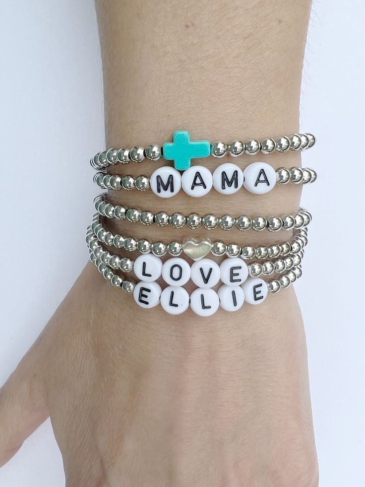 "Personalized Silver Plated Beaded Bracelets are so stunning and chic Wear one as a statement piece or create an original, beautiful, custom stack! These make fun, personalized gifts for moms, grandmas, sisters, brides to be, bridesmaids, flower girls, baby shower, graduations, birthdays, bachelorette party, best friends, teachers... the list is endless..  ►Discounts available starting from 3 items. Please contact us for more details. One discount per purchase. HOW TO ORDER:  ► Select your style Inspirational Silver Beaded Bracelets As Gift, Inspirational Silver Beaded Friendship Bracelets, Meaningful Handmade Jewelry With Round Beads, Inspirational Handmade Jewelry With Round Beads, Silver Name Bracelet With Letter Beads For Friendship, Personalized Inspirational Silver Beaded Bracelets, Trendy Silver Bracelets With Letter Beads, Trendy Silver Bracelet With Letter Beads, Handmade Meaningful Jewelry Bracelet