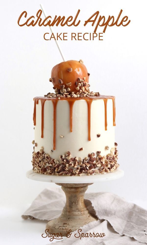 a cake with caramel toppings on top is sitting on a pedestal and has the words caramel apple cake recipe above it