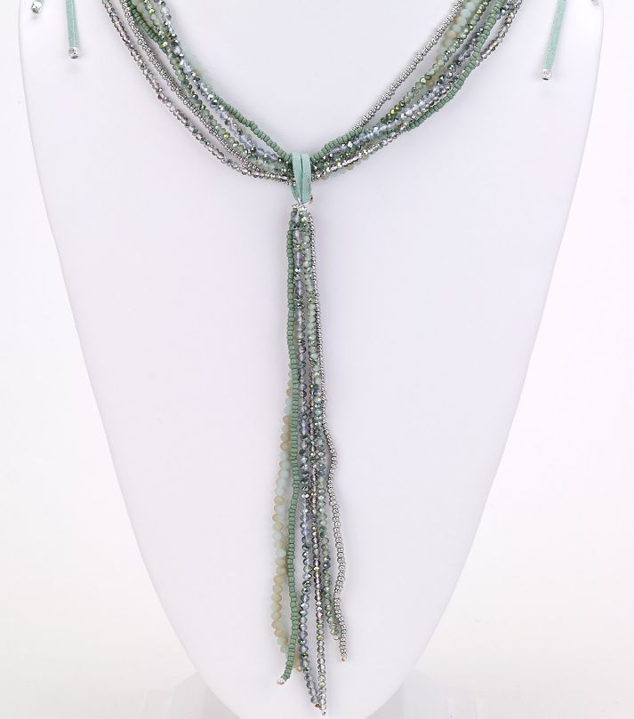 Teal multi-strand beaded necklace on a suede strap featuring a dangle lariat in green teal and gray hues. Adjustable Green Bohemian Lariat Necklace, Adjustable Green Beaded Lariat Necklace, Adjustable Green Lariat Necklace, Adjustable Multi-strand Beaded Lariat Necklace, Elegant Adjustable Green Lariat Necklace, Green Multi-strand Jewelry With Dangling Beads, Teal And Gray, Multi Strand Beaded Necklace, Lanyard Necklace