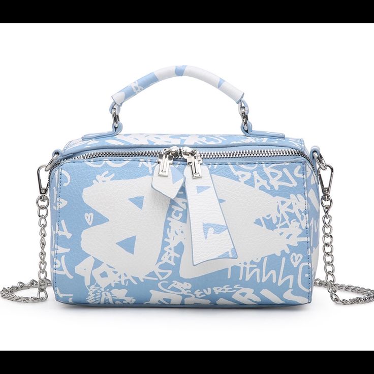 Zip Closure Interior Zip Pocket Detachable Crossbody Strap Gold Or Silver Tone Hardware Dimensions: 8.5"L X 3"W X 5"H Gear Drive, Crossbody Strap, Phone Numbers, Gym Bag, Duffle Bag, Zip Pockets, Graffiti, Blue White, Silver Tone