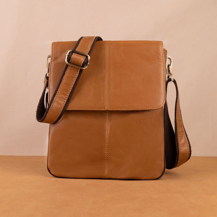 Leather Messenger Bags Crossbody for Men Shoulder Bags Retro Vertical Small Satchel Leather Leather gift for him Anniversary gift Father's Day --ABOUT PRODUCT-- SIZE: 25x21x2cm/9.8x8.3x0.8in --Item Weight: 0.475Kg/1.0Pounds The strap length is 135cm. Bottom zipper unzipped crossbody bag unfolded thickness: 5CM The dimensions are measured manually, and there may be errors. ★Handcrafted from premium leather, this small leather man bag is rugged and long lasting. ★This leather man bag is constructed from only the top layer of the cowhide, giving it extra strength, breathability and durability. ★Designed to be a companion for life, this lmen's bag will only get better with age. Precisely handcrafted by expert artisans, this mens leather man bag is made with only premium brass and metal hardwar Sling Crossbody Bag, Leather Messenger Bags, Travel Messenger Bag, Leather Messenger Bag Men, Mens Crossbody Bag, Casual Purse, Leather Sling Bag, Leather Man, Mens Leather Bag