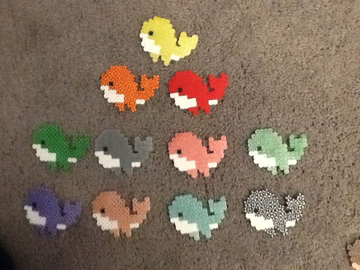 a group of pixelated animals sitting on top of a carpet