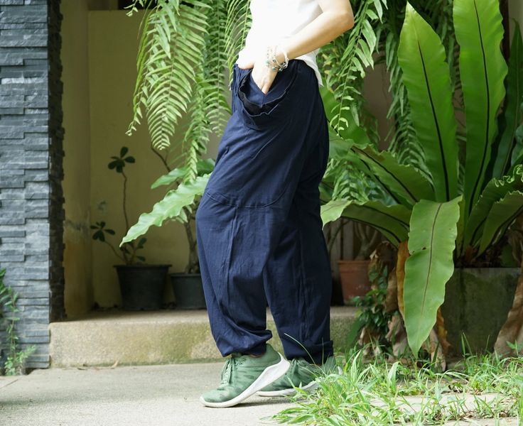 "Casual pants with elastic waist and 2 roomy pocket. If you're looking for the perfect weekend pants, look no further than our roomy pocket pants. The relaxed fit and super roomy pockets make these a casual must-have in your closet. Material: 100% jersey cotton, elastic band Weight : 385g Model is 161 cm. tall with 28\" waist and 38\" hip Measurement: Pants(approximately) Elastic waist: 28\"- 42\" (no zipper) Hip : 48\" Length: 39.5\" (from waist to hem) Leg opening: 11\" PLEASE PROVIDE YOUR PHO Navy Bottoms With Pockets For Outdoor, Navy Outdoor Pants With Pockets, Navy Tapered Leg Pants With Pockets, Navy Outdoor Bottoms With Pockets, Navy Wide Leg Casual Cargo Pants, Casual Navy Baggy Bottoms, Navy Casual Baggy Bottoms, Relaxed Fit Blue Bottoms For Outdoor, Navy Relaxed Fit Cargo Pants With Pockets