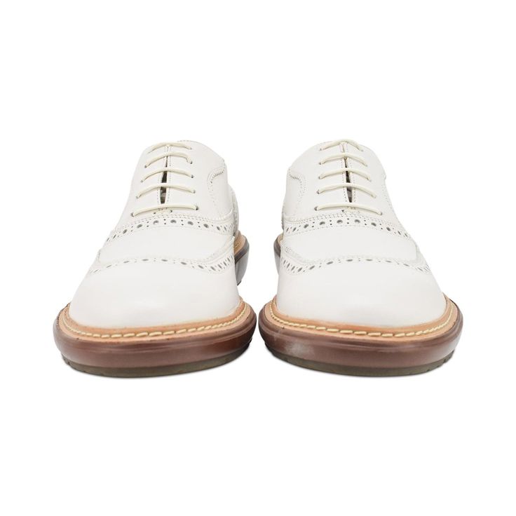 Ferragamo oxford shoes in white leather with brown soles and white laces. Brand = Salvatore Ferragamo Condition = 9/10, like new Size = Men's 8 (Fit like 8.5) Material = Leather SKU = 21749-5 White Plain Toe Lace-up Shoes For Derby, White Lace-up Shoes With Brogue Detailing, White Leather Lace-up Shoes With Textured Sole, Classic White Lace-up Leather Shoes, White Brogue-detailed Oxfords For Semi-formal Occasions, White Oxford Wingtip Dress Shoes, White Brogue Oxfords For Semi-formal Occasions, White Wingtip Oxfords With Brogue Detailing, White Oxfords With Brogue Detailing For Semi-formal Occasions