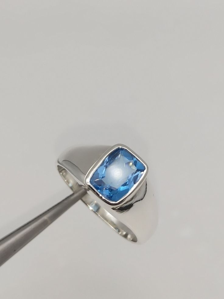 Natural Topaz Men's Ring, Sterling Silver Topaz Ring, Blue Topaz Ring, Men's Promise Ring, 18k Gold Men's Ring, Gift For Him\ About item- Setting - Bezel  Setting Main Gemstone - Natural Blue topaz Mainstone Shape - princess cut Weight:- 5.366 grams (approx.) ♥ Topaz men's Ring ♥ The most unique jewelry you can find, a perfect gift for you and your loved one ♥ Purity - 925/1000 (Silver) 14k (Gold Variations) Purity Stamp - Yes -Processing Time: Each item is handmade with love as we receive order Formal Blue Topaz Gemstone Signet Ring, Formal Blue Topaz Signet Ring, Classic Blue Topaz Ring With Polished Finish, Blue Topaz Ring With Polished Finish, Polished Blue Topaz Ring, Blue Topaz Gemstone Signet Ring, Topas Ring, Promise Rings For Guys, Ring Blue