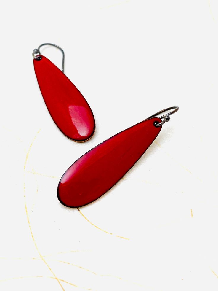 Teardrop Earrings ~ Red Enamel Minimalist Teardrop Drop Earrings Your new favorite red earring! A bold drop of color. Kiln fused enamel on copper. Enamel measures 1 1/2 inch long. Includes Sterling silver earwires. Handmade in Seattle, Wa ❤️ Interested in wholesale? Rad! Email info@magpiemousestudios.com Red Drop Earrings For Gift, Red Long Drop Earrings As Gift, Red Dangle Earrings For Everyday, Red Long Drop Earrings For Gift, Red Jewelry With Matching Earrings For Everyday, Red Teardrop Earrings As A Gift, Red Dangle Earrings For Everyday Wear, Red Hypoallergenic Earrings For Everyday Wear, Nickel Free Red Drop Earrings