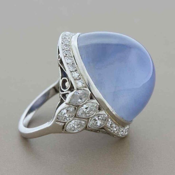 Exquisite Multi-stone Platinum Jewelry, Wedding Fine Jewelry Gemstones With Diamond Accents, Fine Jewelry Gemstones With Diamond Accents For Wedding, Blue Cabochon Diamond Ring, Blue Diamond Cabochon Ring, Blue Diamond Ring With Cabochon Cut, Luxury Cabochon Sapphire Ring For Wedding, Wedding White Gold Gemstones With Diamond Accents, Exquisite Diamond Gemstones For Wedding