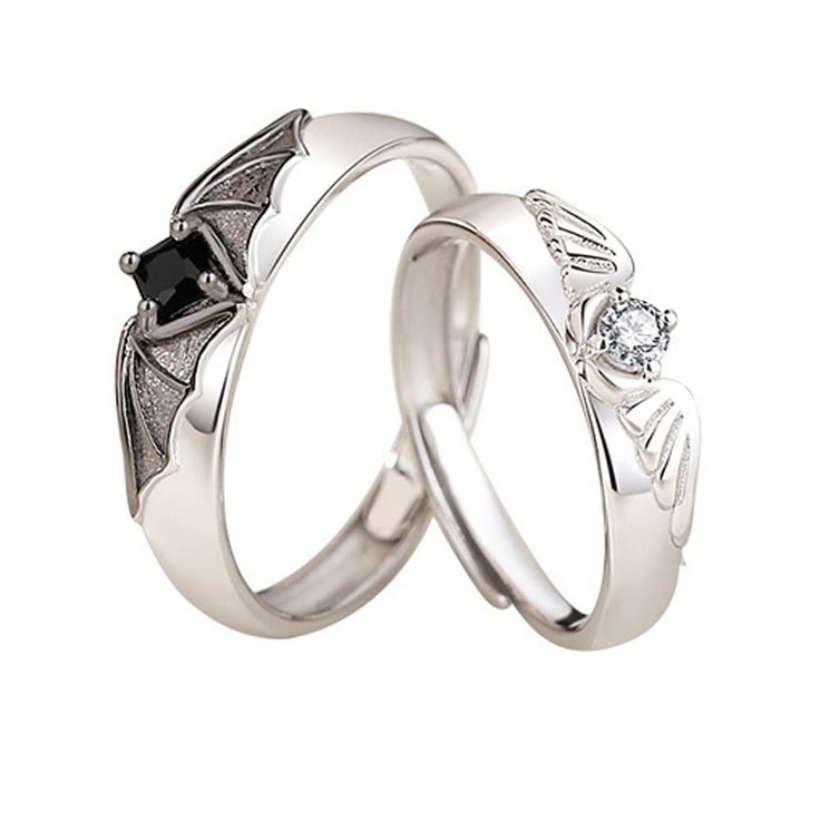 PRICES MAY VARY. DESIGN -- This gothic couples rings is designed by angel and devil wings. The opening of the ring is adjustable. The white symbolizes the angel and the black symbolizes the devil. ADJUSTABLE SIZE --- Devil and angel couple rings has an adjustable function, Fairly easy to resize,Very flexible, easy to put on or take off, suitable for most people to wear. MATERIAL --- Copper+zircon. Angel and devil rings are made of high-quality copper material. The copper material is easy to adju Vintage Wedding Rings Sets His And Hers, Cool Promise Rings, Masc Ring, Matching Rings Aesthetic, Promise Rings For Her Girlfriends, Cute Matching Rings, Gothic Wedding Bands, Boyfriend Promise Ring, Matching Rings For Couples