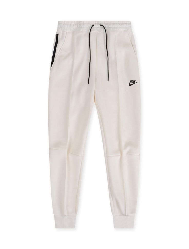 NIKE WMNS SPORTSWEAR TECH FLEECE JOGGERS - PALE IVORY NIKE Nike Fitted Sporty Joggers, White Sporty Joggers For Jogging, White Sweatpants For Winter Jogging, White Fitted Joggers For Streetwear, White Winter Joggers For Jogging, White Winter Sweatpants For Jogging, Winter White Joggers For Jogging, White Nike Jogging Bottoms, White Nike Bottoms For Jogging