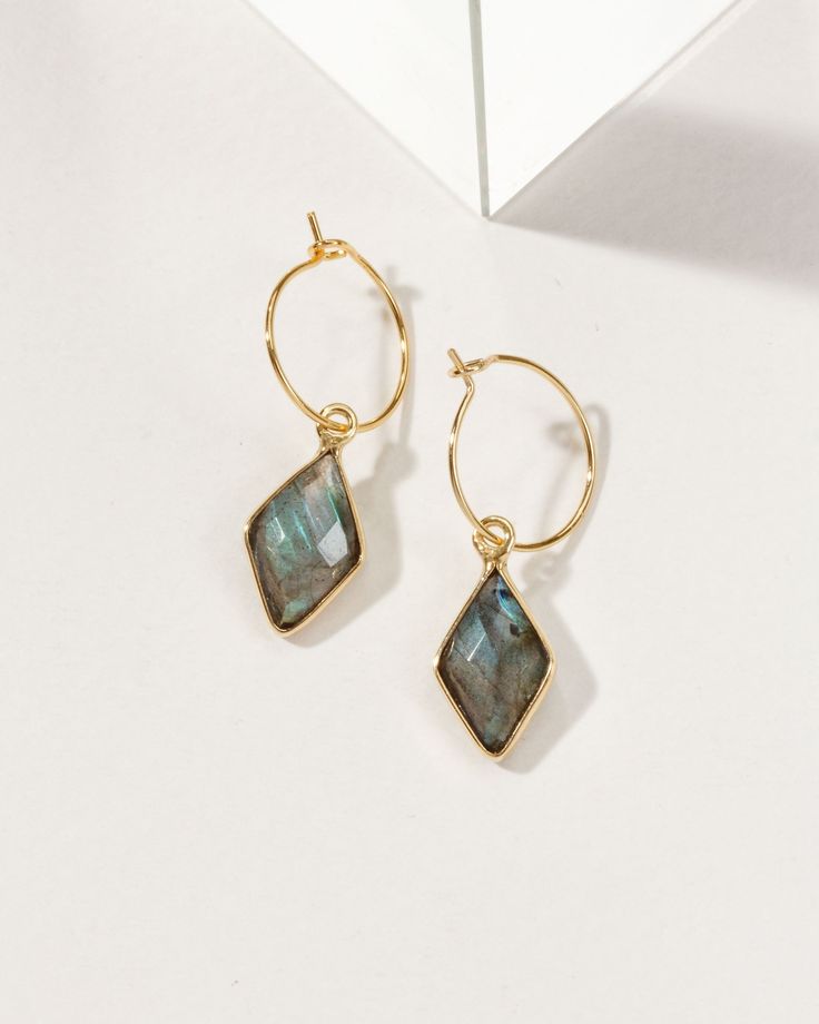 Hey gorgeous, accessorize with intention and channel positive energy. This earring is super lightweight and delicate, making it perfect for everyday wear. These colorful gems are said to radiate positive energy and good vibes so you can feel confident and empowered all day long. 14k Gold Filled Gemstone Hoop Earrings, Small Hoop Gemstone Earrings For Gift, Adjustable Single Crystal Earring For Everyday, Everyday Small Hoop Earrings, Adjustable Gemstone Hoop Earrings As Gift, Adjustable Gemstone Hoop Earrings For Gift, Adjustable Hoop Earrings With Spiritual Style, Gemstone Hoop Earrings As A Gift, Adjustable Hoop Spiritual Earrings