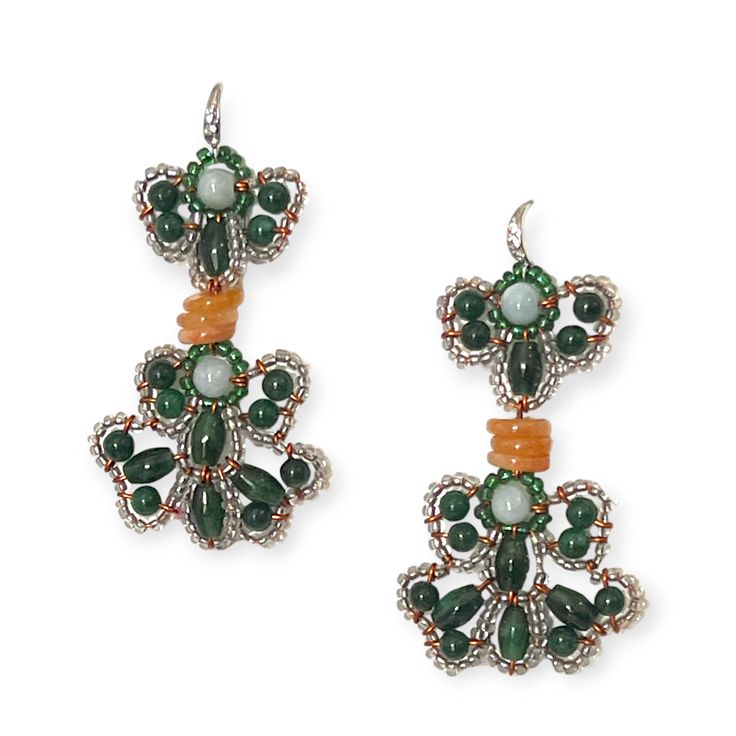 These beaded beauties of green gemstone dangling malachite and elbaite earrings along with amber are set off with seed beads to give it an iridescent look. The rich deep stones offset with the amber and seed beads deliver something special. Made by a husband and wife team that knows how to use gemstones in novel ways these earrings are stunners. Handcrafted earrings in a design that says classic with modern overtones. These one-of-a-kind gemstone earrings are something special and perfect for th Green Jade Earrings With Natural Stones, Green Gemstone Bead Drop Earrings, Green Jade Beaded Drop Earrings, Green Jade Dangle Beaded Earrings, Jade Beaded Drop Earrings, Green Jade Jewelry With Dangling Beads, Elegant Green Jade Beaded Earrings, Green Beaded Jade Earrings, Elegant Green Gemstone Beaded Earrings