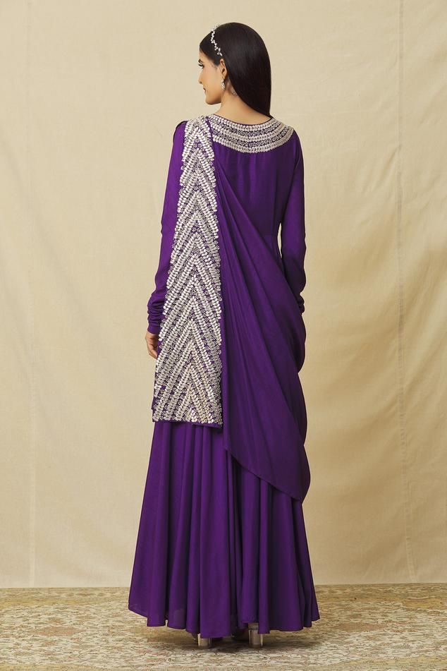 Purple anarkali with floral gota, sequin, pearl embroidery and gathered detailing. Paired with embroidered drape dupatta.
Components: 2
Pattern: Embroidered
Type Of Work: Geometric
Neckline: Round
Sleeve Type: Full
Fabric: Russian silk, Lining: Cotton
Color: Purple
Other Details: 
Gathered detailing
Back cutout drape
Occasion: Puja - Aza Fashions Drape Dupatta, Purple Anarkali, Embroidered Anarkali, Pearl Embroidery, Fashion App, Embroidered Silk, Anarkali, Aza Fashion, Fashion Set