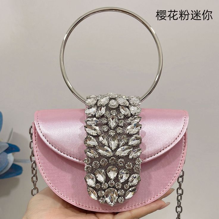 Place Of Origin : GUANG DONG Province Place Of Origin : GUANG DONG Province Occasion : Versatile Exterior : none Interior : No Pocket Hardness : SOFT Closure Type : COVER Pattern Type : Solid Gender : WOMEN Style : fashion Decoration : CHAINS,diamonds Lining Material : None Main Material : Silk Shape : Saddle Please allow 1-3 cm error due to manual measurement.          WHAT ABOUT REFUND?   Fast refund,100% Money Back Guarantee. If your product is defective or doesnt work properly, let us know and well send you a replacement one. We believe in our products so much that we offer a 30-day No-Hassle refund policy. If youre unhappy about your purchase, send us the product back and well refund your money immediately. Phone 7, Party Purse, Ring Handle, Satin Bags, Clutch Purse Evening, Luxury Designer Handbags, Diamond Chain, Designer Handbag, Purple Bags