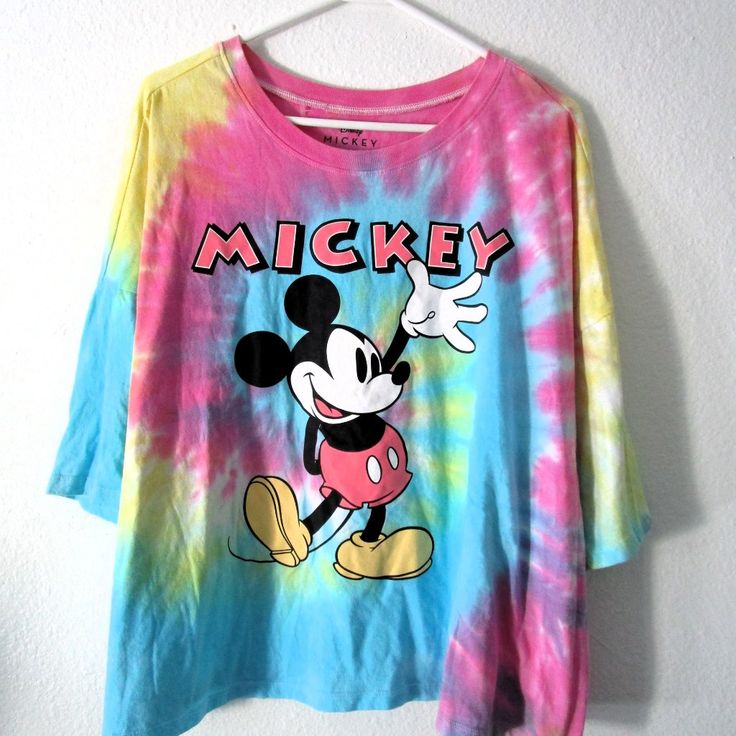 A Gently Used Disney Mickey Mouse Crop T-Shirt Tie-Dye Rainbow Colors Size Xxxl Women. Approx. Measurements Are Armpit To Armpit 27" Length 24" (See Images) No Damages You Are Purchasing The One In The Images. Please Ask Questions Before Buying. Thank You. I Go Hunting To Amazing Thrift Shops To Bring You Great Shirts; Some Of Them Are Brand New Others Gently Used. I Try My Best To Check For Spots Or Other Damages But I Can Overseen Some Of Them. Thank You So Much For Looking At My Shirts. Multicolor Disney Crew Neck T-shirt, Multicolor Disney T-shirt For Summer, Multicolor Cartoon Print Tops For Disney Fan Events, Disney Multicolor Mickey Mouse T-shirt, Multicolor Graphic Tee For Disney Fan Events, Graphic Tee For Disney Fan Events In Multicolor, Playful Tie Dye Cotton Tops, Playful Cotton Tie Dye Tops, Playful Cotton Tie-dye Tops