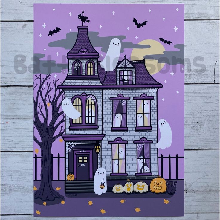 a paper cut out of a house decorated for halloween