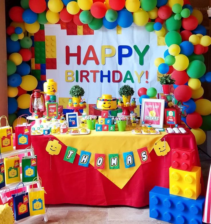 a birthday party with legos and balloons