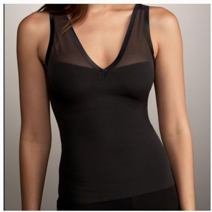 Spanx Haute Spanx 476 Alluring V-Neck Camisole Black From Spanx Haute Contour Line It’s Obvious Spanx Is Designed By Women For Women With This Spanx Alluring V-Neck Camisole. For Any V-Neck Dress, This Is The Perfect Tool To Slim And Support. The Reinforced Front Microfiber Panel Shapes And Supports The Stomach And Waist Area. Size - Xs Color - Black Style - 478 Condition - Brand New With Tag Nwt Inc-Shaper-Panties-1 V-neck Shapewear With Built-in Bra, Bra-friendly Fitted V-neck Tank Top, Elegant V-neck Stretch Shapewear, Fitted V-neck Top With Medium Bust Support, V-neck Bra Friendly Top For Night Out, Seamless Fitted V-neck Shapewear, Black Shaping Tops With Built-in Bra, Black Camisole With Built-in Bra For Layering, Seamless V-neck Tank Top For Night Out