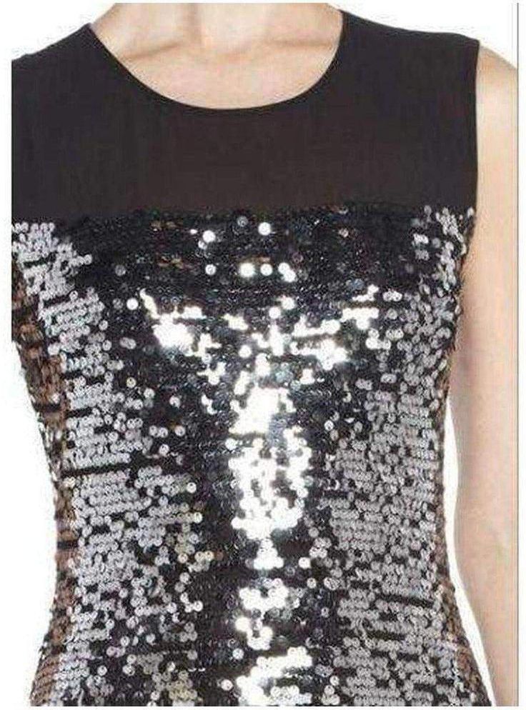 Go for glamorous evening appeal with this shimmering sequin-embellished gown. Round neck. Sleeveless. Allover sequin embellishment with mesh contrast at yoke. Button-closure keyhole at upper back. Sequined Mesh: Nylon, Spandex. Chiffon: Polyester. Dry Clean. Festive Sleeveless Sequin Dress With Contrast, Festive Sleeveless Dress With Contrast Sequins, Formal Sleeveless Sequin Dress With Glitter, Evening Embellished Sleeveless Sequin Fabric, Elegant Sleeveless Sequin Dress With Contrast Sequin, Contrast Sequin Sleeveless Evening Dress, Sleeveless Sequin Party Dress, Sparkling Sleeveless Sequin Dress For Formal Events, Sparkling Sleeveless Sequin Dress For Formal Occasions