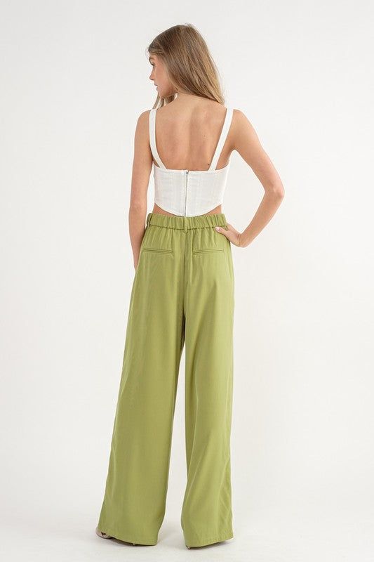 Featuring a high waist and wide leg design, Helena Trouser Pants are the perfect blend of trendiness and comfort. The eye-catching color adds a stylish touch, while the trouser design is perfect for wear to work. Pair with a fitted top for an ultra-polished look. Specifications: High Waste Wide Leg Front pleats Back Elastic Staple Dress, Trouser Design, Wide Leg Dress Pants, Pants Large, Fitted Top, Wear To Work, Fashion Fits, Dress Pant, Black Style