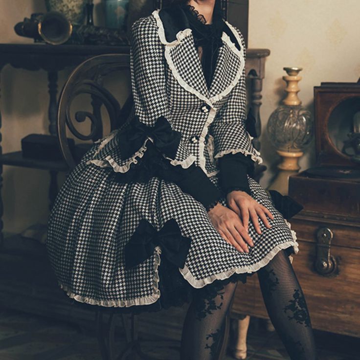 Vintage-Style Jacket And Skirt Set With Houndstooth Patterning. Cannot Be Found In Stores Or Online These Days. Ornate Triple Layer Layer Ruffle Trim Under Skirt And Sleeves. The Matching Bow Knots Are Removable And Can Be Positioned Anywhere On The Dress. Velvet Lapel Collar And High-Waisted, Flounce Hemline Skirt With Elastic Band. I Got This Because Of Cold Weather, But I Required More Insulation The Further North I Traveled. Great For Those Of Minimal Bust Size. Kept Sealed In A Smoke And Pet-Free Closet. The Fabric Is Quite Durable, Making This Elegant Set Sure To Last. Elegant Black Houndstooth Skirt, Black Harajuku Style Winter Skirt, Gothic Ruffled Skirt, Gothic Tiered Ruffle Skirt, Vintage Houndstooth Skirt, Vintage Style Jacket, Jacket And Skirt Set, Random Clothing, Pirate Dress