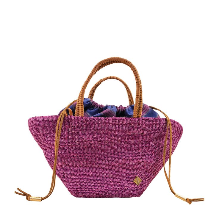 Abaca, leather, polyester Dimensions: 13.5" x 4.5" x 6" Wipe with cloth Made in the Philippines | Aranaz Taffy Tote Bag in Grape Filipino Crafts, Simple Tote, Designer Tote Bags, Wicker Bags, Sewing Purses, Wedding Gifts For Bridesmaids, Designer Totes, Taffy, Essential Items