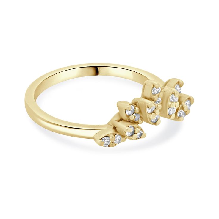 a yellow gold ring with three diamonds on it