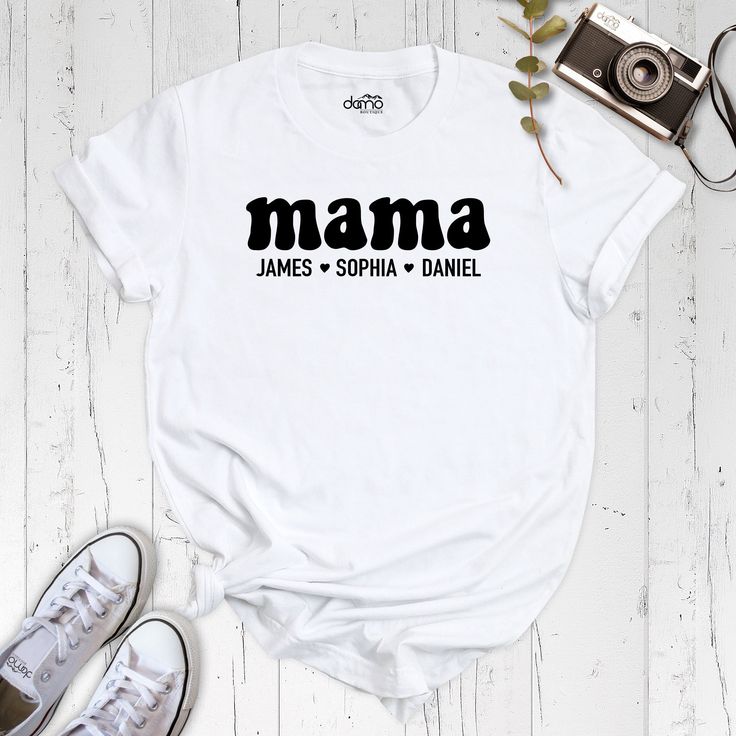 "Looking for a custom-made t-shirt to show off your love for your little ones? Look no further than our custom \"Mama\" shirt, featuring your choice of personalized names! Crafted with the highest-quality materials, our custom mama shirt is the perfect way to show off your unique bond with your children. Each shirt is made to order, with your choice of up to three names expertly printed onto the front. Not only is our custom mama shirt stylish and comfortable, but it also makes for the perfect gift for any proud mom. Whether you're looking to treat yourself or surprise a loved one, our shirt is sure to be a hit. And with our easy-to-use online ordering system, getting your hands on your very own custom mama shirt has never been easier. So why wait? Order yours today and show off your love Writer Shirts, Matching Sibling Outfits, Funny Kids Shirts, Custom Made T Shirts, Mother Shirts, Space Shirts, Cow Shirt, Custom Kids, Online Ordering