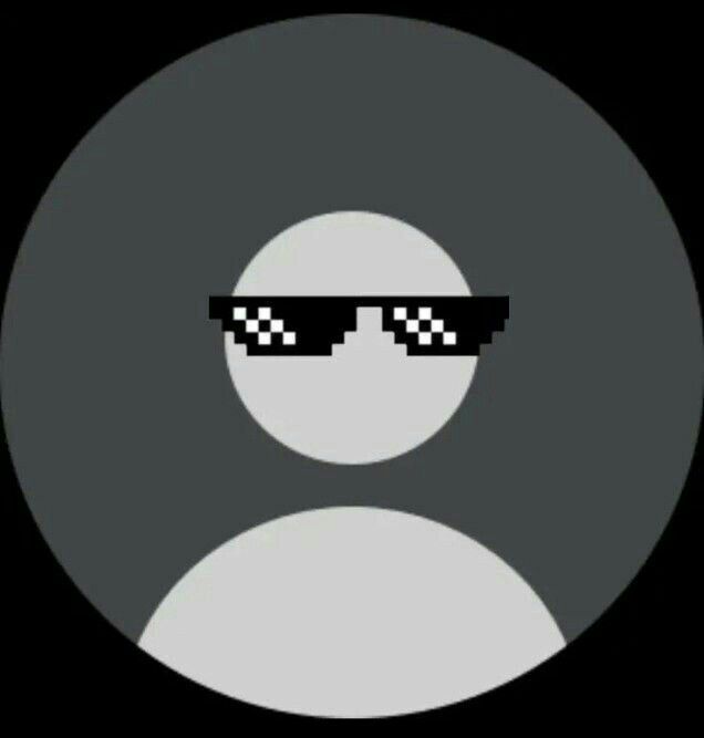 a black and white circle with some glasses on it's face in front of a dark background