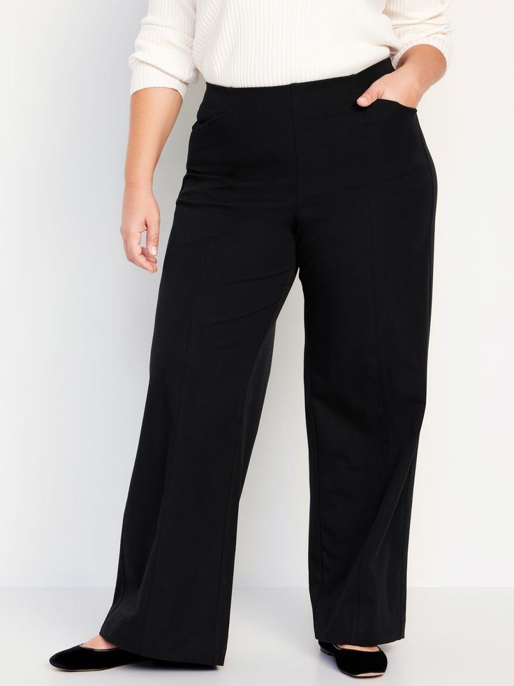 elasticized waist front pockets faux-welt back pockets sits at belly button loose hip and thigh wide leg hits below ankle 30" regular inseam 28" petite inseam 34" tall inseam models are approx.  5'9" and wear sizes s (4), l (12), and xl (18)machine wash according to the care instruction label Relaxed Fit Mid-rise Wide Leg Pants With Hip Pockets, Relaxed Fit Solid Dress Pants With Side Pockets, Loosely Fitted Straight Leg Work Pants With Elastic Waistband, Business Casual Wide Leg Pull-on Bottoms, High-waisted Relaxed Fit Dress Pants With Elastic Waistband, Relaxed Fit High-waisted Dress Pants With Elastic Waistband, Mid-rise Pants With Elastic Waistband For Work, Relaxed Fit Wide Leg Work Pants With Welt Pockets, Mid-rise Solid Pull-on Pants