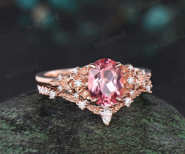 - Metal: Solid gold(10K/14K/18K white/yellow/rose gold),925 sterling silver,platinum available- Main Stone: 6x8mm oval lab Papalacha pink sapphire- Accent Stone: diamonds or moissanites- Wedding Band Stone: diamonds or moissanites- Band Width: About 1.4mm- Can be personalized: Yes Pastel Engagement Ring, Pink Diamond Ring With Accents For Wedding, Pink Diamond Ring With Diamond Accents For Wedding, Pink Diamond Ring With Rose Cut Diamonds For Wedding, Pink Gold Diamond Ring With Accents For Wedding, Pink Gold Wedding Ring With Diamond Accents, Pink Gold Wedding Diamond Ring With Accents, Elegant Pink Bridal Sets As Gift, Elegant Pink Bridal Sets For Gift