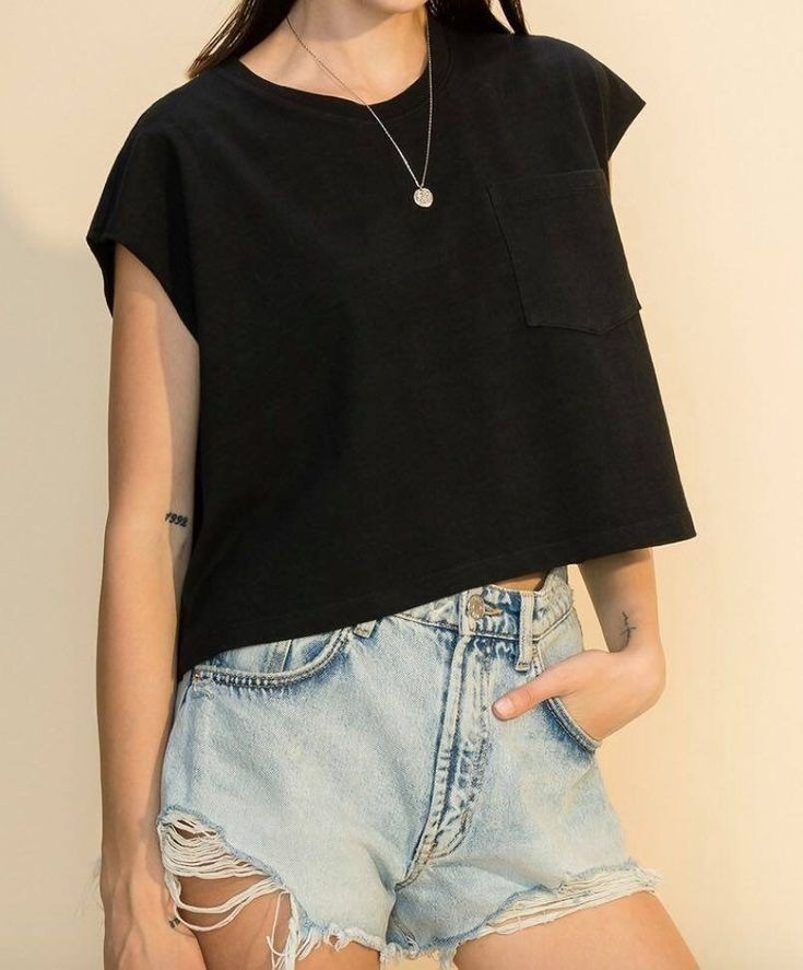 Oversized cropped muscle tee, crew neck with pocket in black. -100% Cotton Oversized Cropped T-shirt For Everyday, Everyday Oversized Cropped T-shirt, Everyday Basic Tops With Pockets, Basic Everyday Tops With Pockets, Basic Tops With Pockets For Everyday, Black Relaxed Fit Muscle Tee For Everyday, Black Boxy Cropped T-shirt, Casual Style, Casual Boxy Black Cropped T-shirt, Black Boxy Cropped Top