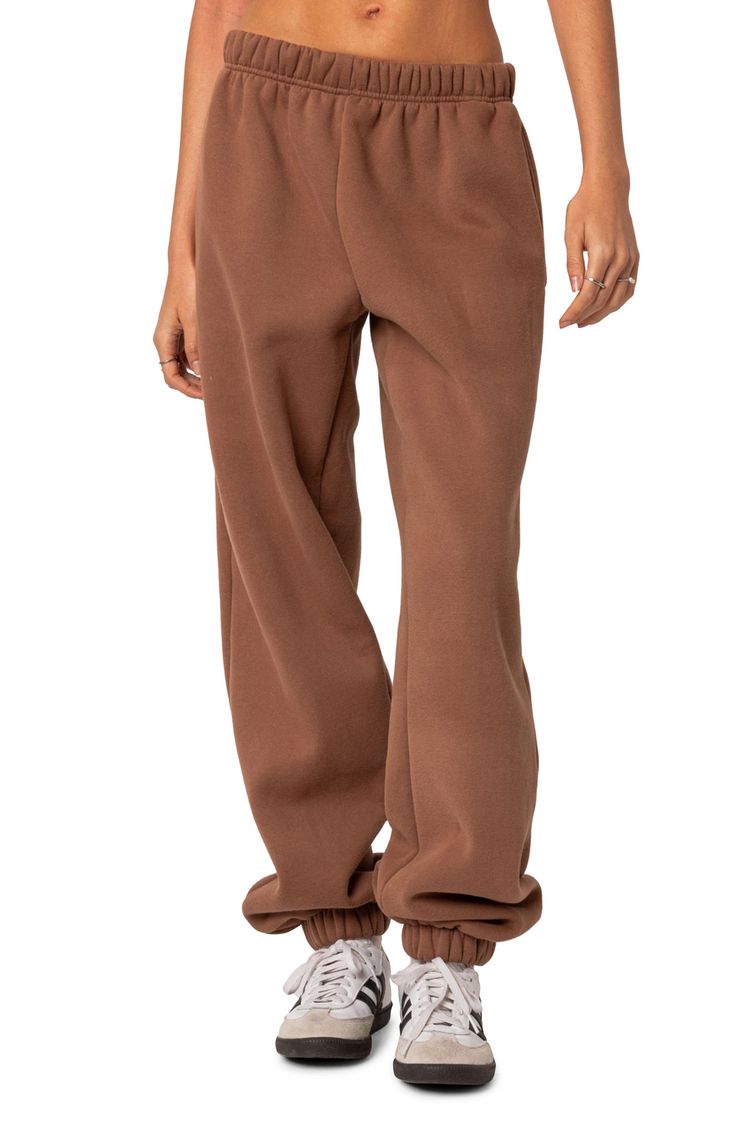 A cozy cotton blend keeps you feeling your best no matter what the day brings when you choose these oversized sweatpants. Elastic waist Side-seam pockets Elastic cuffs 50% cotton, 50% polyester Machine wash, dry flat Imported Low Rise Wide Leg Jeans, Oversized Sweatpants, Bottoms Pants, Wide Leg Jeans, Oversized Fits, Leg Jeans, Low Rise, Womens Bottoms, Elastic Waist