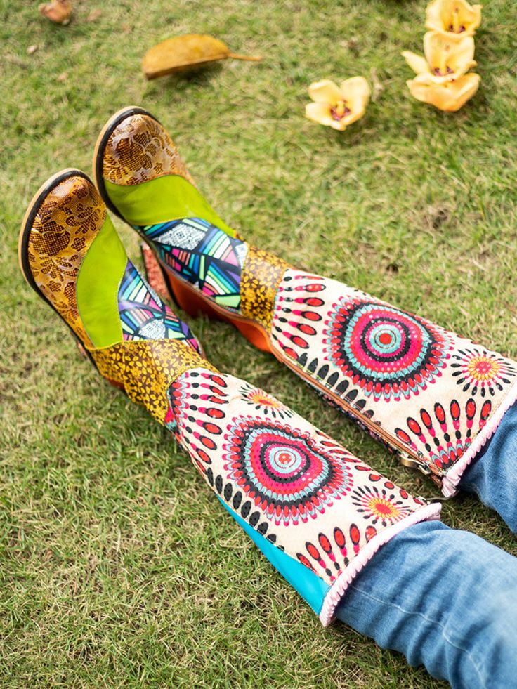 With a stunning vintage floral print design and a cow leather construction, these boots take your footwear game to the next level and ensure a bold look. 1.57'' heel 14.8 shaft 14.2 circumference Zip closure Genuine leather upper Leather / Textile lining Leather footbed Leather midsole Rubber sole Bohemian Knee-high Leather Boots, Bohemian Multicolor Boots For Spring, Multicolor Bohemian Boots For Spring, Bohemian Leather Knee-high Boots, Fall Bohemian Leather Heeled Boots, Bohemian Leather Heeled Boots For Fall, Bohemian Mid-calf Boots For Fall, Bohemian Leather Boots For Winter, Bohemian Knee-high Boots For Fall