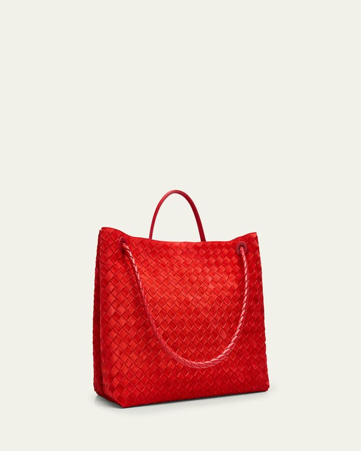 Bottega Veneta "Andiamo" tote bag in intreccio suede and leather     Rolled top handle     Shoulder strap    Can be worn as a top handle or shoulder bag     Open top with center knot drawstring strap     Interior, one zip pocket and two slip pockets     Approx. 13.8"H x 16.5"W x 7.1"D    Made in Italy Designer Bucket Bag With Braided Handles For Daily Use, Designer Handheld Bags With Braided Handles, Evening Bags With Woven Leather And Double Handles, Designer Bags With Braided Handles And Top Handle, Luxury Shoulder Bag With Braided Handles For Shopping, Designer Bags With Top Handle And Braided Handles, Designer Bags With Braided Handles, Evening Shoulder Bag With Braided Double Handles, Evening Bags With Braided Double Handles